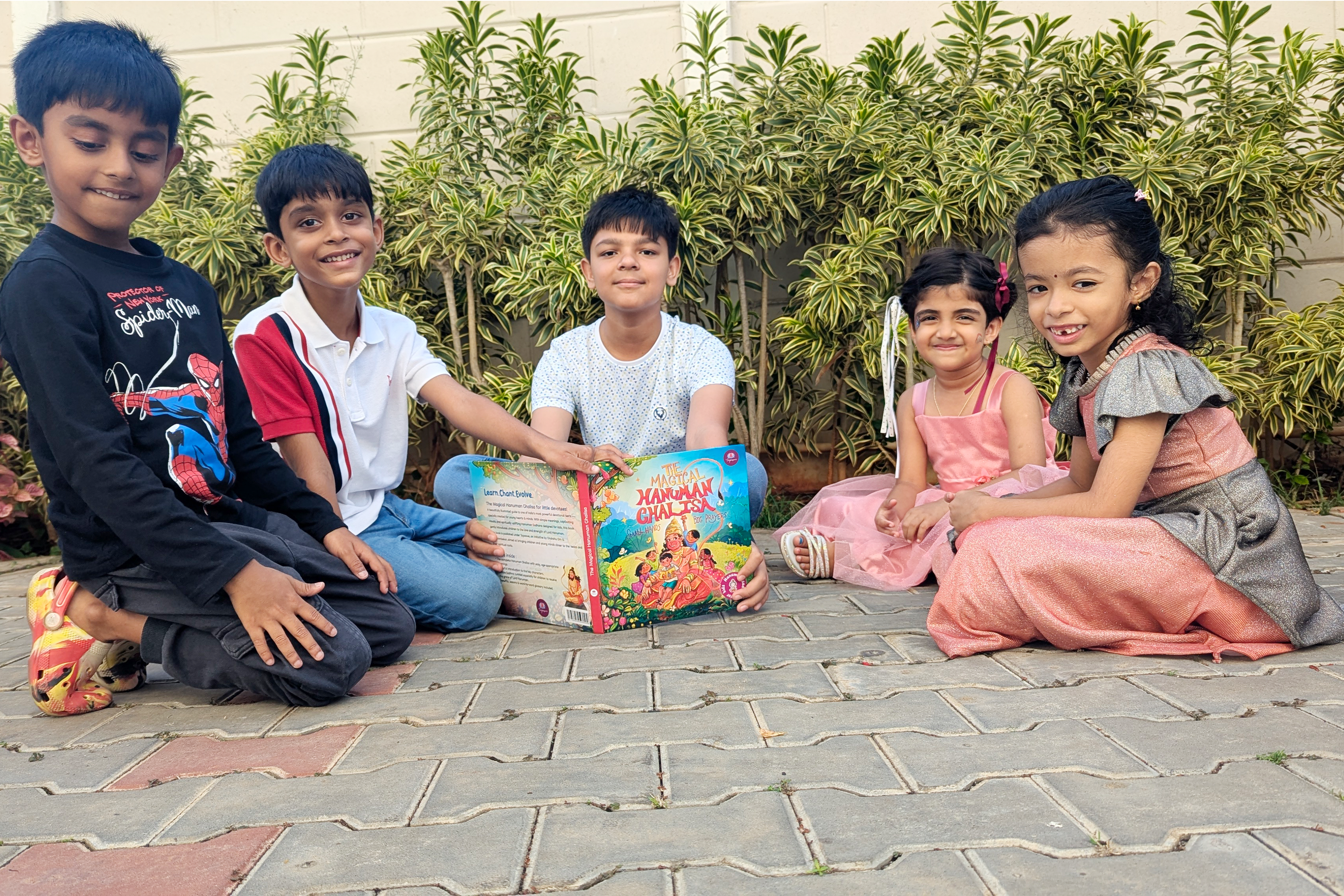 Child aged 6 to 9 reading the Chalisa